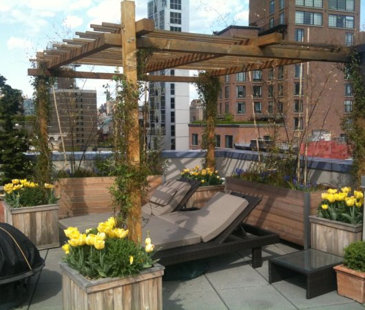 We custom build fences furniture and privacy partitions for backyards and patios in Greenwich Village.