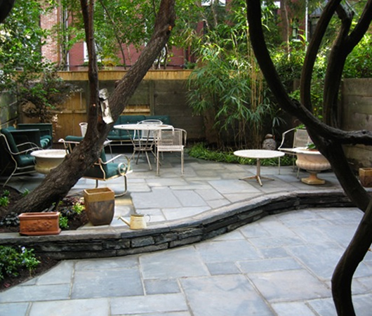 Rooftop deck construction and installation patio bluestone hardscape design and backyard landscaping in midtown nyc.